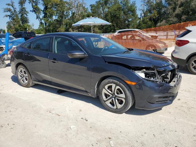 Photo 4 from auction – 2018 HONDA CIVIC LX with VIN 19XFC2F55JE033259