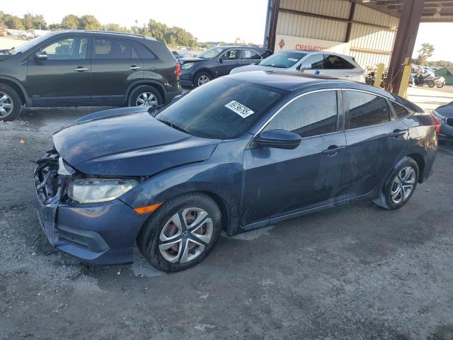 HONDA CIVIC LX 2017 with VIN 2HGFC2F51HH511662 - Photo from auction