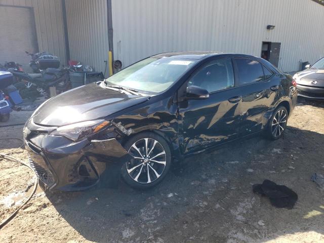 TOYOTA COROLLA L 2017 with VIN 2T1BURHEXHC860992 - Photo from auction