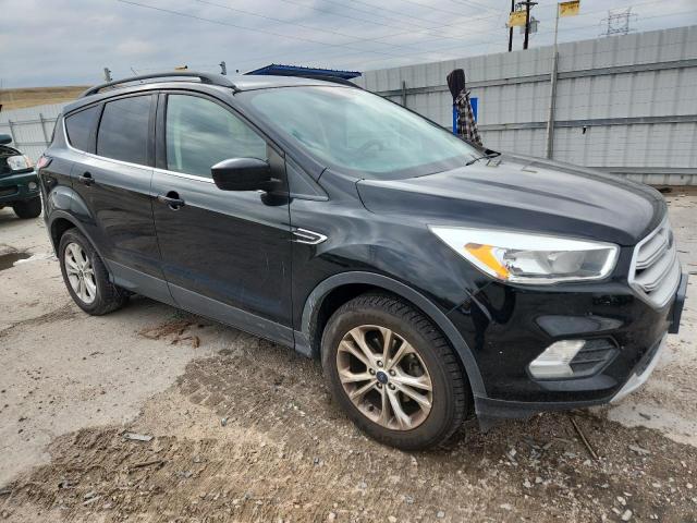 Photo 4 from auction – 2018 FORD ESCAPE SE with VIN 1FMCU0GD1JUA65505