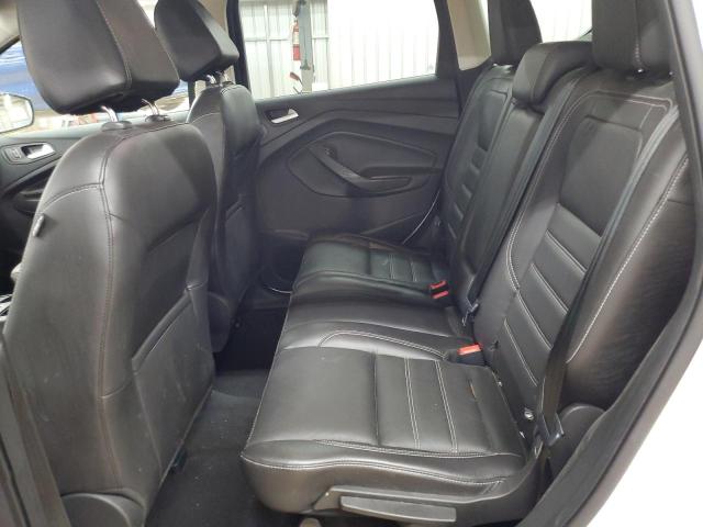 Photo 11 from auction – 2017 FORD ESCAPE TIT with VIN 1FMCU0J93HUE90366