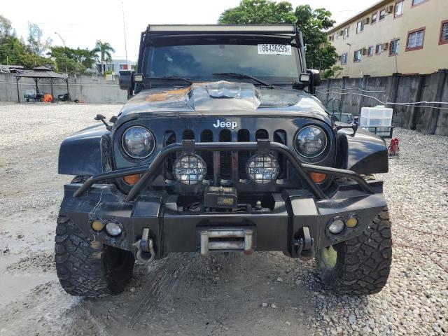 Photo 5 from auction – 2010 JEEP WRANGLER U with VIN 1J4BA5H12AL104094
