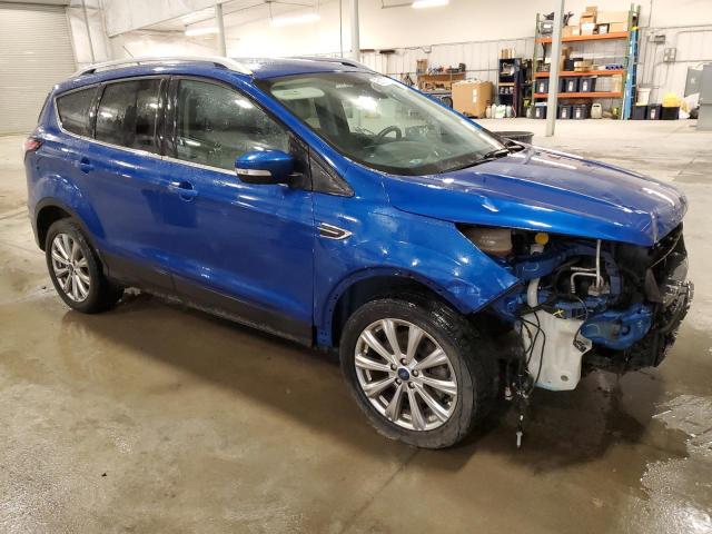 Photo 4 from auction – 2017 FORD ESCAPE TITANIUM with VIN 1FMCU9J98HUC01731