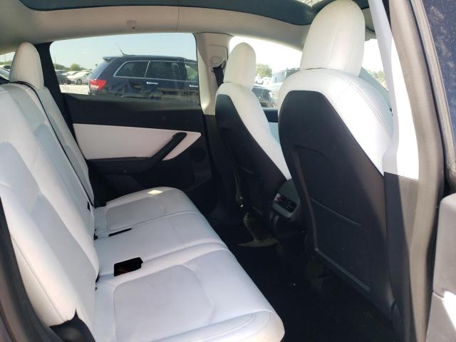 Photo 11 from auction – 2022 TESLA MODEL Y with VIN 7SAYGAEE7NF433884
