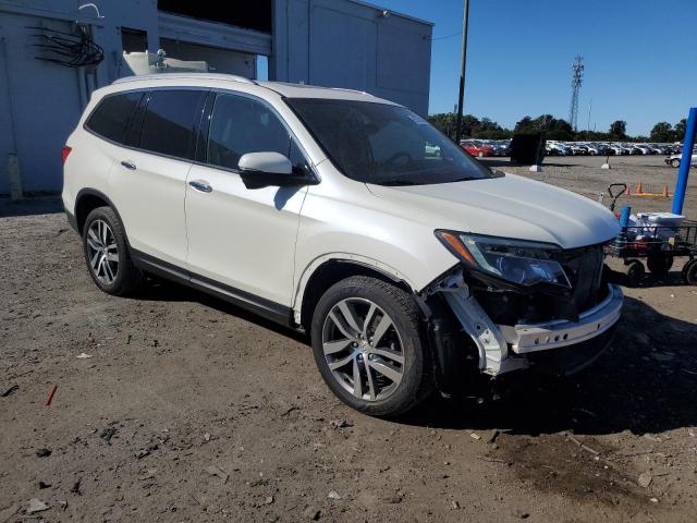 Photo 4 from auction – 2018 HONDA PILOT TOURING with VIN 5FNYF6H95JB019931