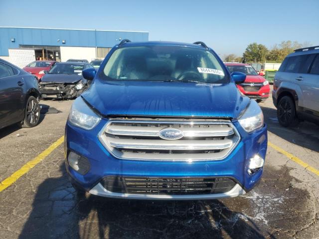 Photo 5 from auction – 2018 FORD ESCAPE SE with VIN 1FMCU9GD0JUC02857