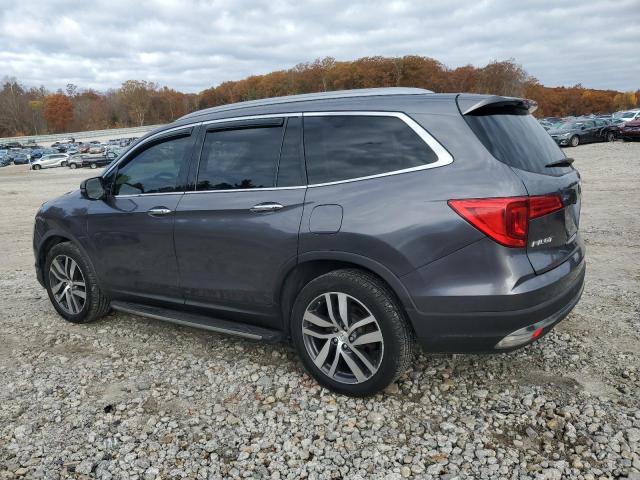 Photo 2 from auction – 2016 HONDA PILOT TOUR with VIN 5FNYF6H94GB024093