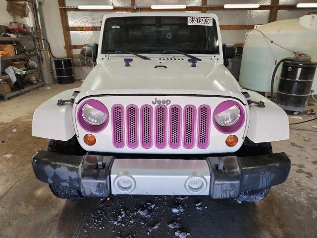Photo 5 from auction – 2011 JEEP WRANGLER U with VIN 1J4BA5H19BL557873