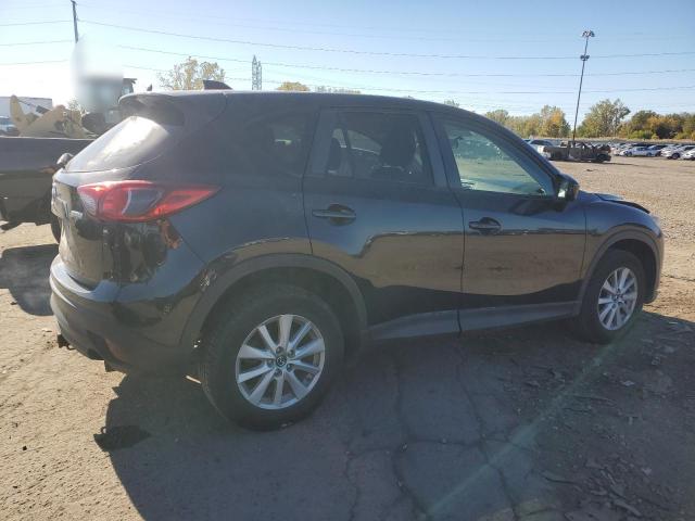 Photo 3 from auction – 2015 MAZDA CX-5 TOURI with VIN JM3KE4CY6F0447578