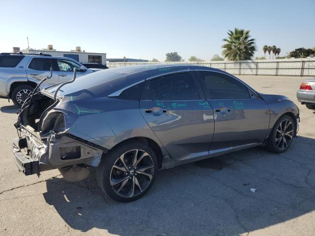 Photo 3 from auction – 2021 HONDA CIVIC SPOR with VIN 2HGFC2F86MH525948