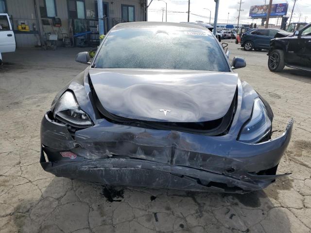 Photo 5 from auction – 2023 TESLA MODEL 3 with VIN 5YJ3E1EB7PF712743