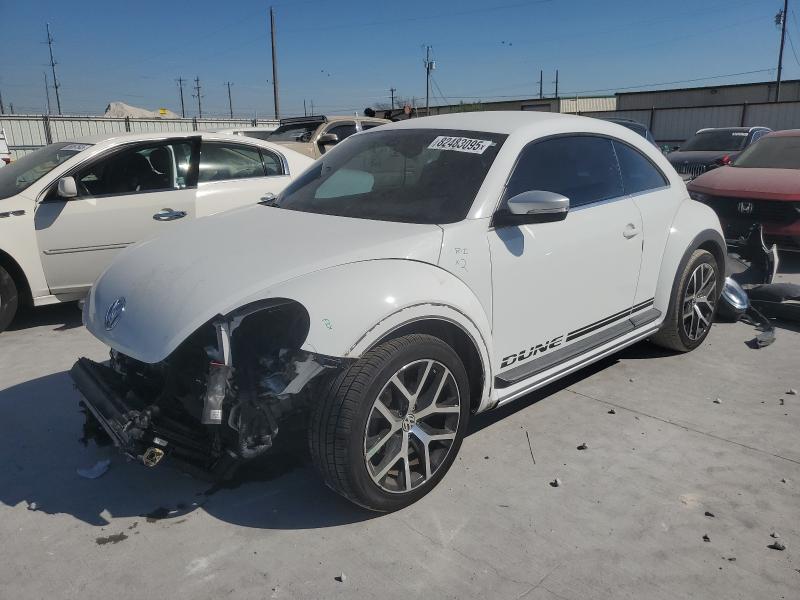 VOLKSWAGEN BEETLE DUN 2016 with VIN 3VWS17AT0GM633772 - Photo from auction