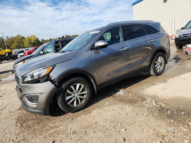 KIA SORENTO LX 2016 with VIN 5XYPG4A33GG020127 - Photo from auction