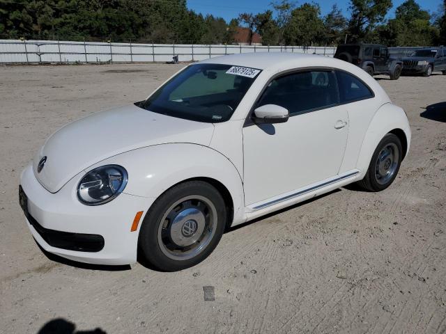VOLKSWAGEN BEETLE 2012 with VIN 3VWJP7AT0CM640290 - Photo from auction