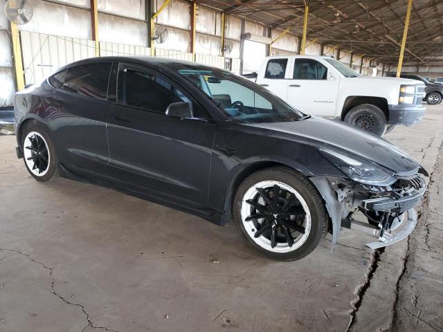 Photo 4 from auction – 2022 TESLA MODEL 3 with VIN 5YJ3E1EB6NF131683
