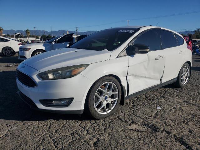FORD FOCUS SE 2015 with VIN 1FADP3K23FL358297 - Photo from auction