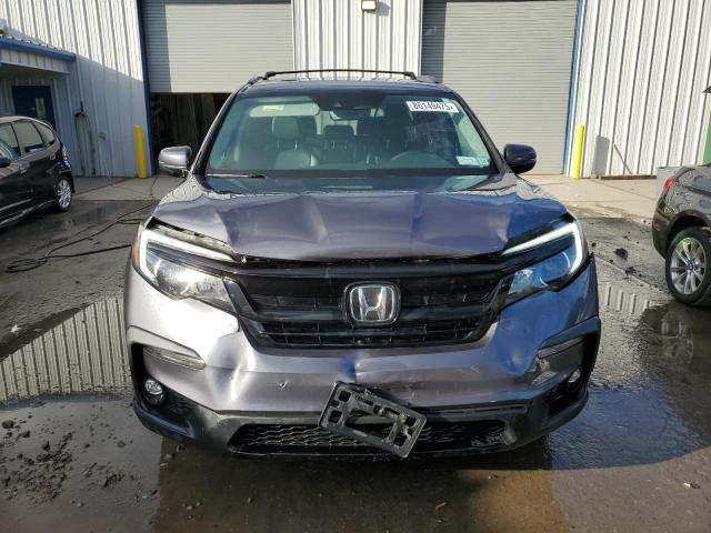 Photo 5 from auction – 2021 HONDA PILOT SE with VIN 5FNYF6H28MB096901