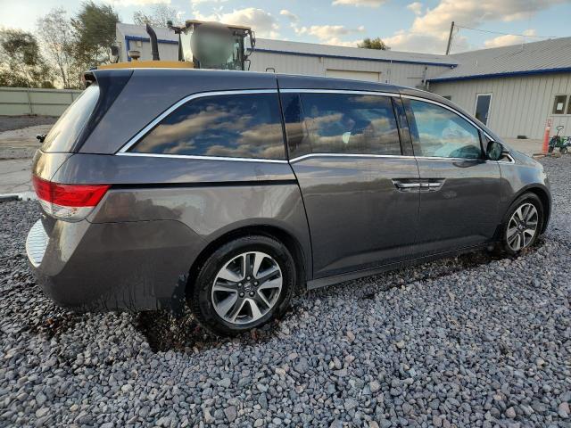 Photo 3 from auction – 2014 HONDA ODYSSEY TO with VIN 5FNRL5H99EB097660