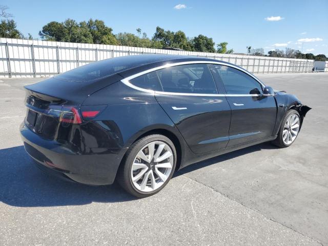Photo 3 from auction – 2019 TESLA MODEL 3 with VIN 5YJ3E1EA4KF412402