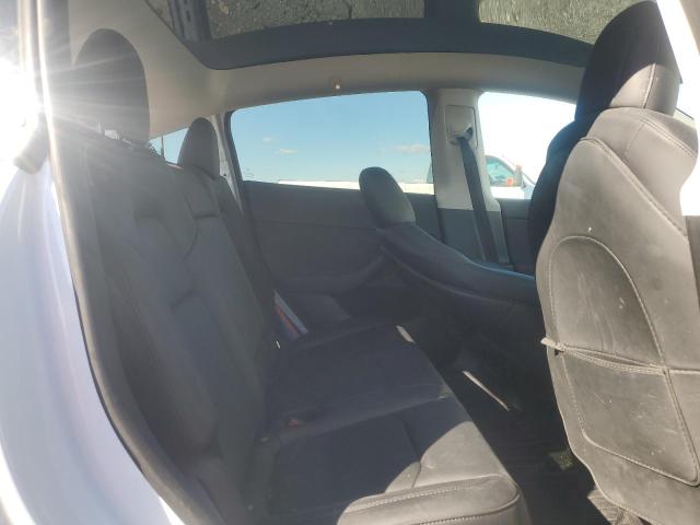Photo 10 from auction – 2023 TESLA MODEL Y with VIN 7SAYGDEE0PF645885