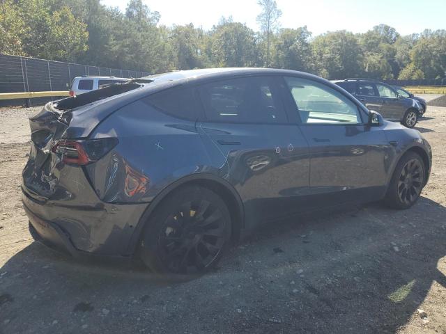 Photo 3 from auction – 2021 TESLA MODEL Y with VIN 5YJYGAEE9MF296278