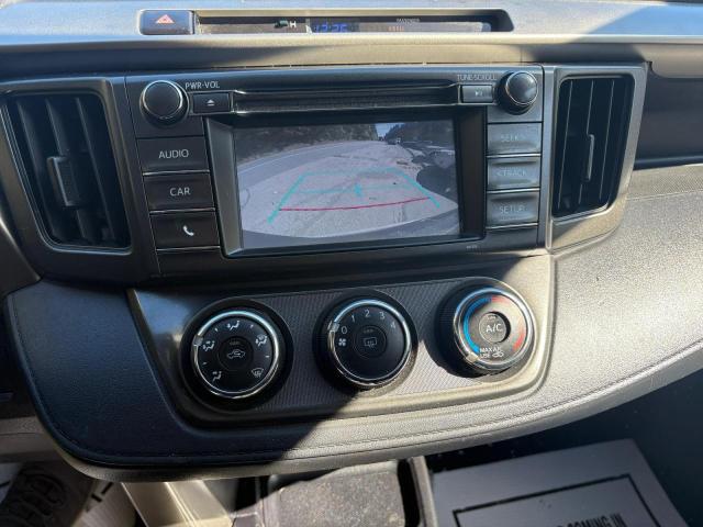 Photo 9 from auction – 2015 TOYOTA RAV4 LE with VIN 2T3BFREV2FW283652