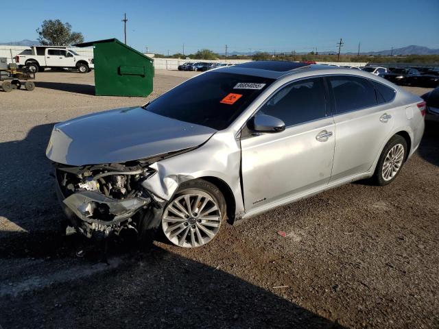 TOYOTA AVALON HYB 2014 with VIN 4T1BD1EB4EU026268 - Photo from auction