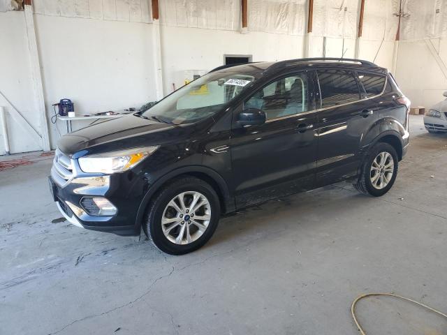 FORD ESCAPE SE 2018 with VIN 1FMCU9GDXJUA04397 - Photo from auction