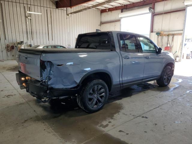 Photo 3 from auction – 2023 HONDA RIDGELINE with VIN 5FPYK3F15PB046988
