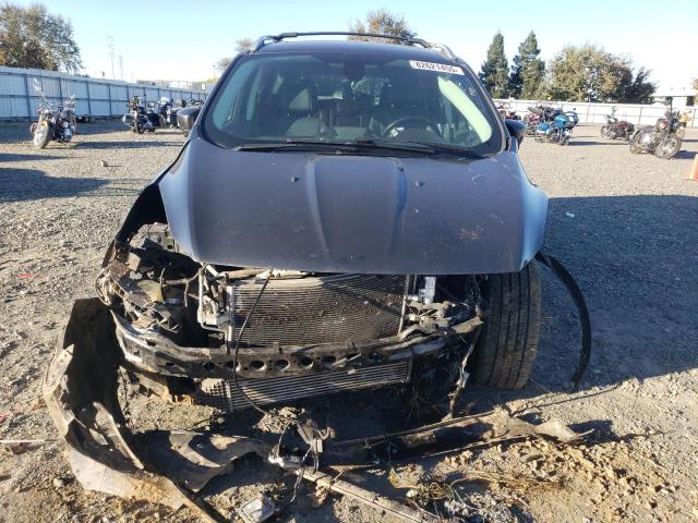 Photo 5 from auction – 2016 FORD ESCAPE TITANIUM with VIN 1FMCU0J92GUB60961