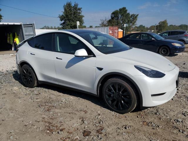 Photo 4 from auction – 2023 TESLA MODEL Y with VIN 7SAYGDEE6PF751404