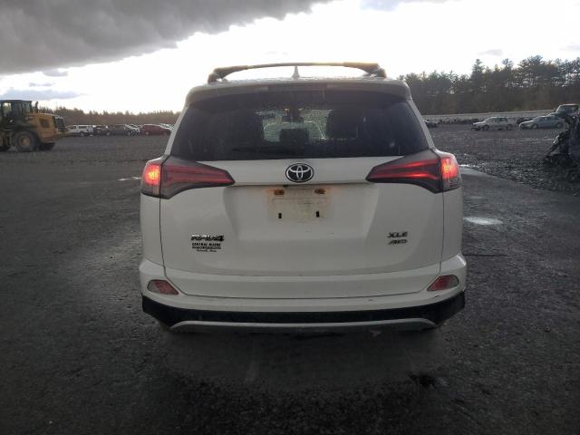 Photo 6 from auction – 2017 TOYOTA RAV4 XLE with VIN JTMRFREV5HJ138668