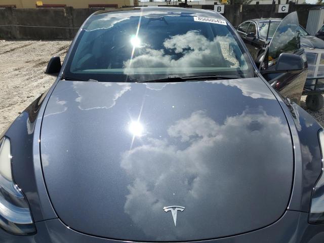 Photo 11 from auction – 2021 TESLA MODEL Y with VIN 5YJYGDEE1MF084721