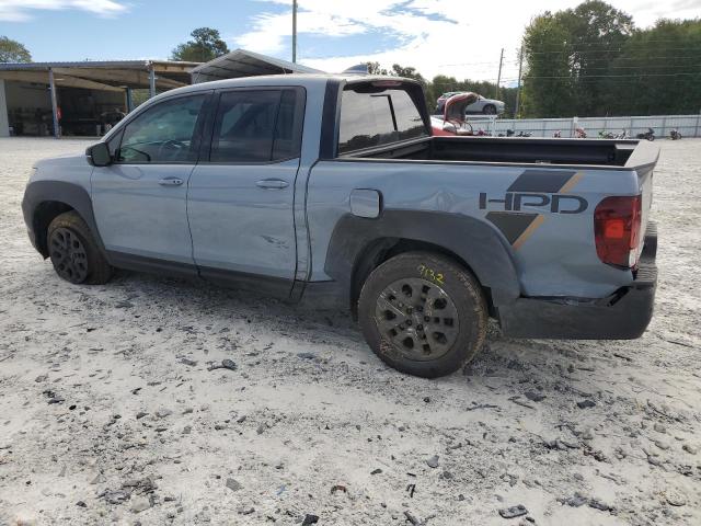 Photo 2 from auction – 2022 HONDA RIDGELINE with VIN 5FPYK3F88NB037146