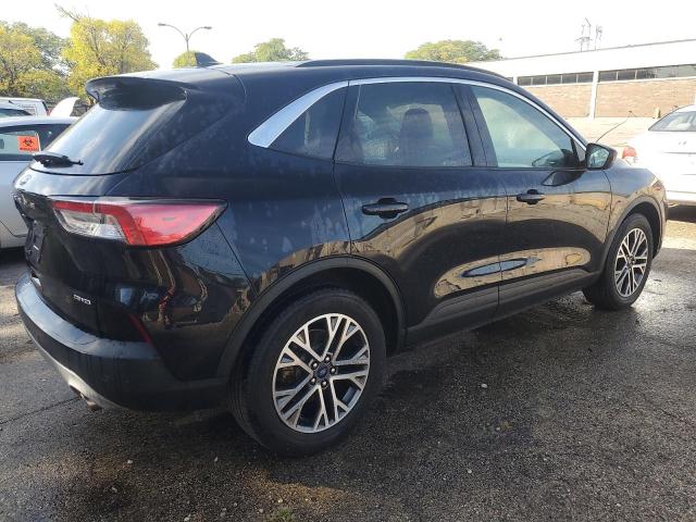 Photo 3 from auction – 2021 FORD ESCAPE SEL with VIN 1FMCU9H65MUA12573