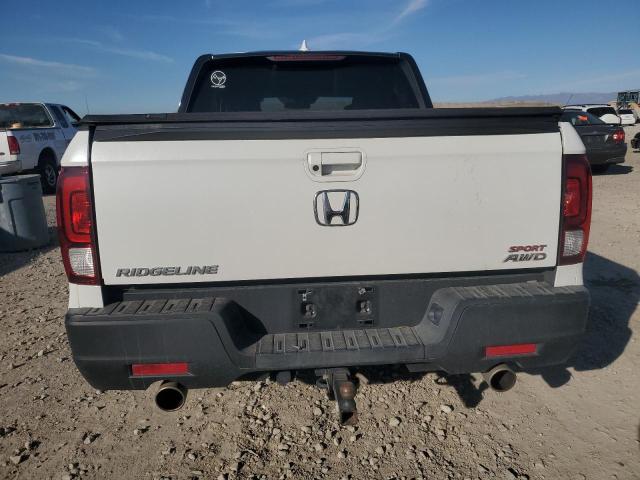 Photo 6 from auction – 2021 HONDA RIDGELINE with VIN 5FPYK3F12MB011434