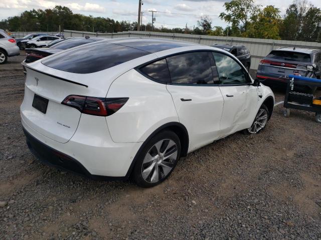 Photo 3 from auction – 2022 TESLA MODEL Y with VIN 7SAYGDEE1NA019014