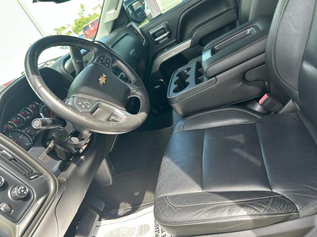 Photo 13 from auction – 2015 CHEVROLET SILVERADO with VIN 1GC1KWE85FF550686