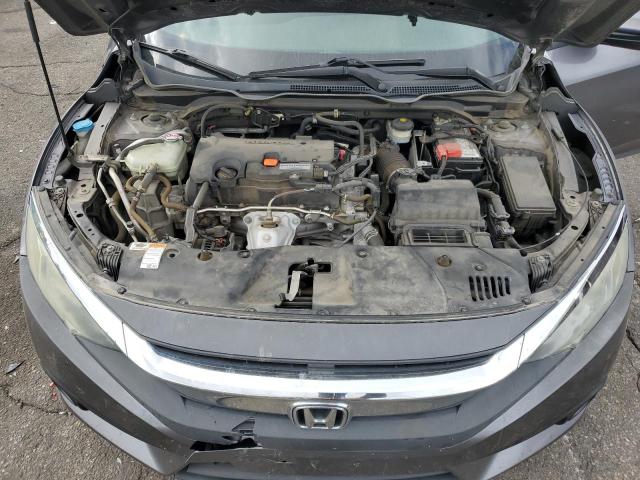 Photo 11 from auction – 2018 HONDA CIVIC EX with VIN 19XFC2F87JE015503