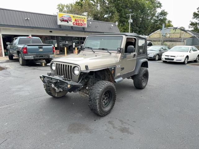 Photo 2 from auction – 2004 JEEP WRANGLER X with VIN 1J4FA39S64P753911