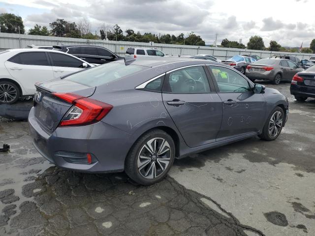 Photo 3 from auction – 2016 HONDA CIVIC EXL with VIN 2HGFC1F71GH651804