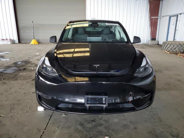 Photo 5 from auction – 2023 TESLA MODEL Y with VIN 7SAYGDEE6PF961291