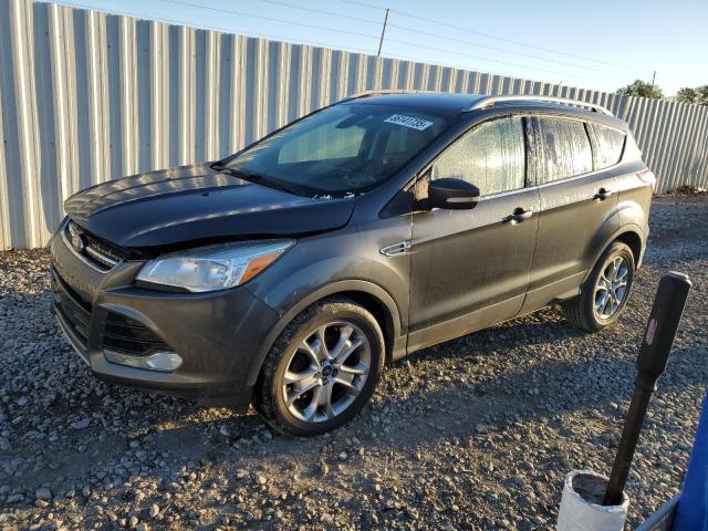 FORD ESCAPE TIT 2015 with VIN 1FMCU0JX9FUA72857 - Photo from auction