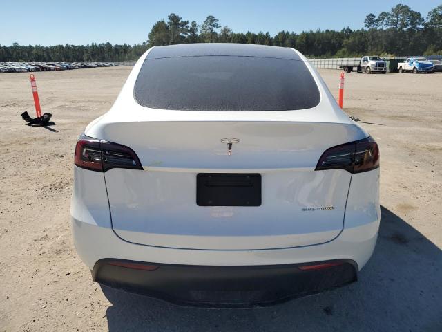 Photo 6 from auction – 2023 TESLA MODEL Y with VIN 7SAYGAEE7PF877589