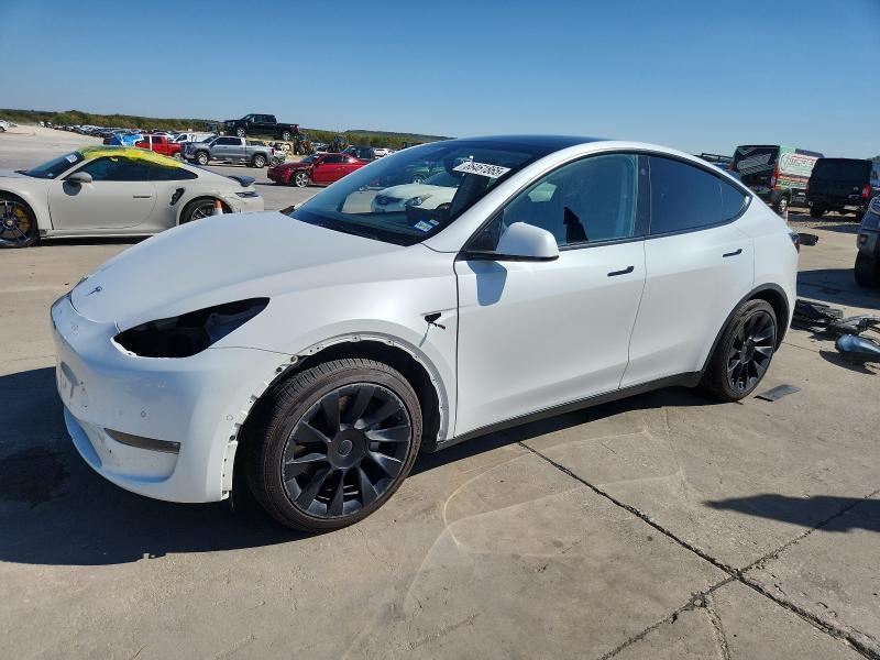TESLA MODEL Y 2022 with VIN 7SAYGAEEXNF337604 - Photo from auction