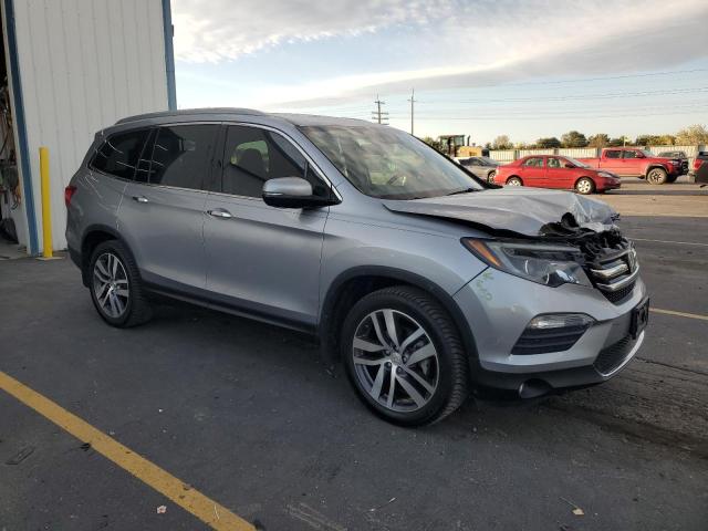 Photo 4 from auction – 2016 HONDA PILOT ELIT with VIN 5FNYF6H03GB016861