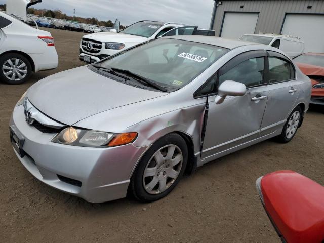 HONDA CIVIC LX 2010 with VIN 19XFA1F52AE045031 - Photo from auction