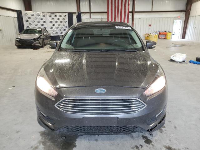 Photo 5 from auction – 2015 FORD FOCUS SE with VIN 1FADP3K27FL354334