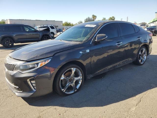 KIA OPTIMA LX 2018 with VIN 5XXGT4L33JG237777 - Photo from auction