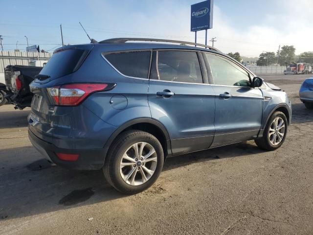 Photo 3 from auction – 2018 FORD ESCAPE SE with VIN 1FMCU0GD6JUC17908